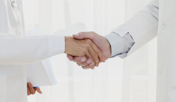 doctors-shaking-hands-close-up